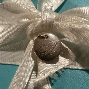 Tiffany & Co small initial “A” round disk charm